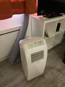 Appartements Quai 86 - Studio, clim mobile, parking, proche gare & centre : photos des chambres
