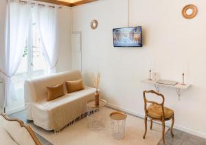 Appartements Le Petit Versailles - Face gare - Wifi - Baignoire : photos des chambres