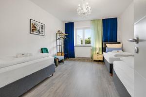 KATIES Apartments Augsburg - Zentral - 4 Zimmer - 7 Personen - 2 Parken - Nintendo Switch - DisneyPlus - E-Kamin