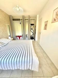 Maisons de vacances Chez Audrey - Charmante villa - Jardin & Clim : photos des chambres