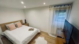 Appartements Le Havre d-Athena, App spacieux 2 chambres, Grand Jardin Prive, Sauna, WiFi & Abri Velos : photos des chambres