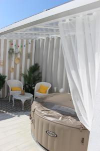 Appartements GITE AVEC SPA ENTRE FORET ET PLAGE - Ambiance Bord de Mer : photos des chambres