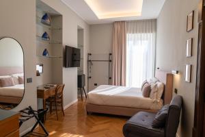 Habitación Triple Deluxe con balcón