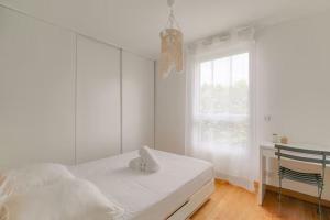 Appartements Superbe 2 pieces terrasse a 400 m du metro : photos des chambres