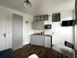 Appartements Studio sur le port : photos des chambres