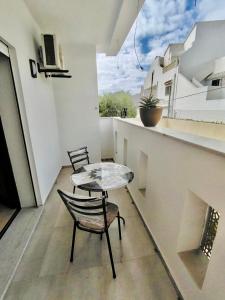 Charming 2-Bedroom Apartment with Garden View Balcony