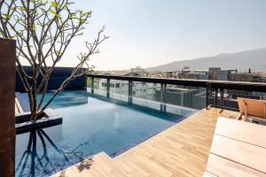 Charm Suite Nimman with Rooftop