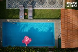 StayVista at Casa Ti Amo with WiFi, AC, Pool, BBQ