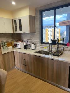 celestial suites apartment with heated swimming pool well equipped gym ample parking space children playing ground and relaxing rooftop with amazing scenic views