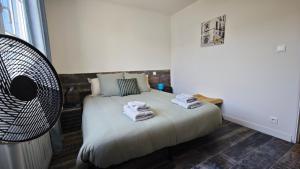 Maisons de vacances Maison Familiale Deco Vintage Jardin Parking Puy duFou : photos des chambres