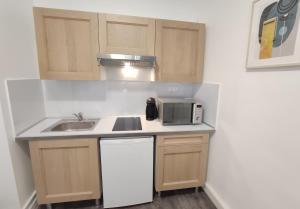 Appartements Studio charmant et central : photos des chambres