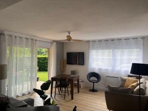 Appartements Appartement avec jardin a 2 pas du lac : photos des chambres