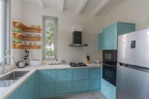 Villa Mandarina - Luxury 4BHK Villa Near Morjim Beach with Pvt Pool, Pool Table & Kids Playground