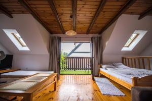 Ardea Mikołajki domek