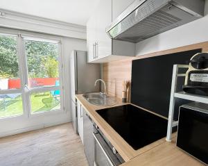 Appartements Confort et calme en terrasse a deux pas de Caen : photos des chambres