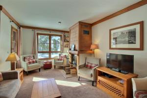 ARC 1950 - Appartement 10 personnes Duplex Cheminée - ski aux pieds - Sauna, Hammam, Jacuzzi, Piscine