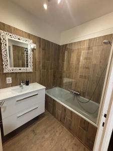 Appartements Appartement COSY au centre L-Aragon : photos des chambres