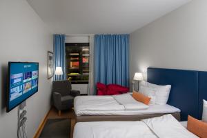 Standard Twin Room Play - Inside Superpark view room in Hotel Sveitsi