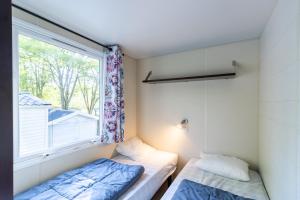 Maisons de vacances Mobilhome Du Bonheur : photos des chambres