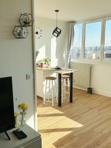 Appartements Cozy Home La Defense U Arena long sejour aussi : photos des chambres