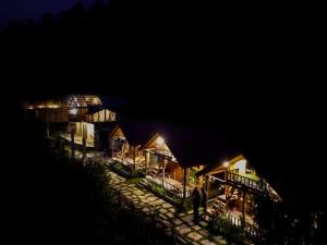 Glass House by Himalayan Cedar Nest