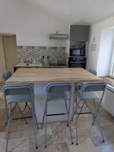Appartements Entre cuves et sources - au coeur de Goudargues : photos des chambres
