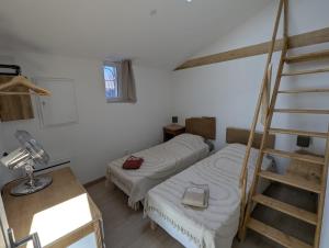 Appartements Entre cuves et sources - au coeur de Goudargues : photos des chambres