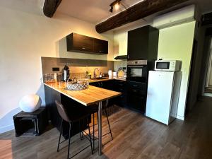 Appartements Le Cosy de Montfort : photos des chambres