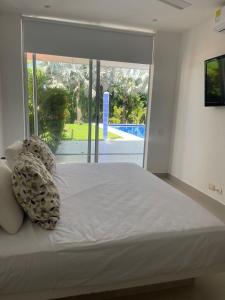 Amplio y cómodo apto para 6 a Max 12 personas con piscina privada en Laguna Club