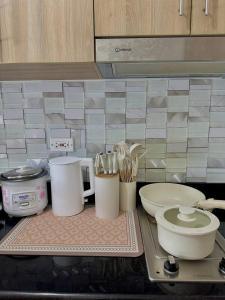 Cozy Condo Staycation with Balcony near Mall of Asia