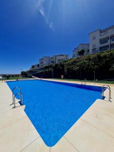 Chic and cosy apartment with a pool