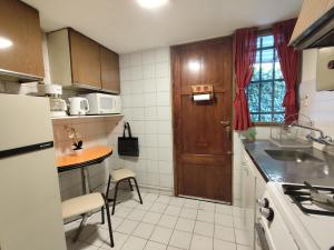 Departamento PB patio y cochera