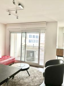 Appartements T3 au centre ville avec balcon, parking gratuit : photos des chambres