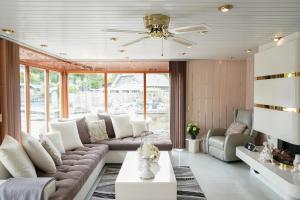 Chalet with waterfront sauna and boat
