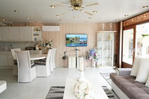Chalet with waterfront sauna and boat