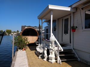 Chalet with waterfront sauna and boat