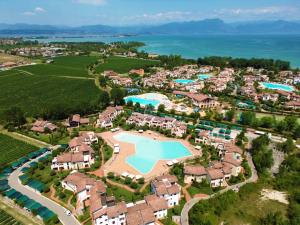 Resort Apartment - Borgo esclusivo con Piscine e Campi sportivi