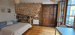 Appartements La Brique Cadurcienne : photos des chambres