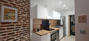 Appartements La Brique Cadurcienne : photos des chambres