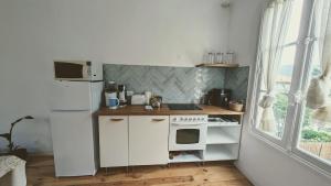Appartements La Maison Verdemar : photos des chambres