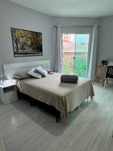 Suíte Conforto com AR, TV e sacada em Florianópolis