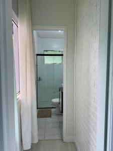 Suíte Conforto com AR, TV e sacada em Florianópolis