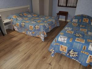 Triple Room room in Hotel des Voyageurs
