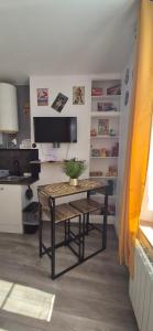 Appartements Le petit vintage #souvenirs# : photos des chambres
