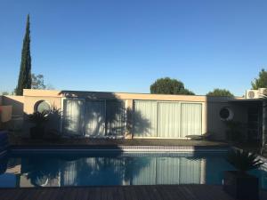 Appartement cosy avec piscine partagée
