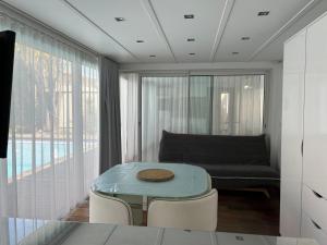 Appartement cosy avec piscine partagée