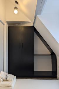 Appartements T2 au Coeur Historique de Dijon avec Clim & SmartTV : photos des chambres