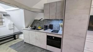 Appartements T2 au Coeur Historique de Dijon avec Clim & SmartTV : photos des chambres