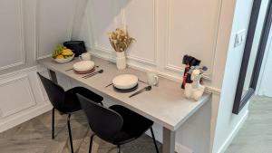 Appartements T2 au Coeur Historique de Dijon avec Clim & SmartTV : photos des chambres