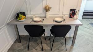 Appartements T2 au Coeur Historique de Dijon avec Clim & SmartTV : photos des chambres